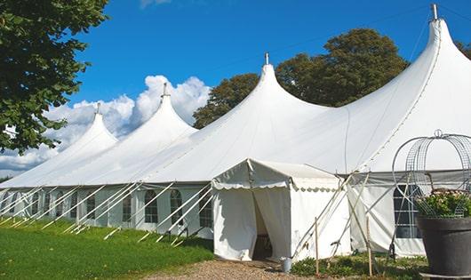 a line of sleek and modern portable restrooms ready for use at an upscale corporate event in Chantilly